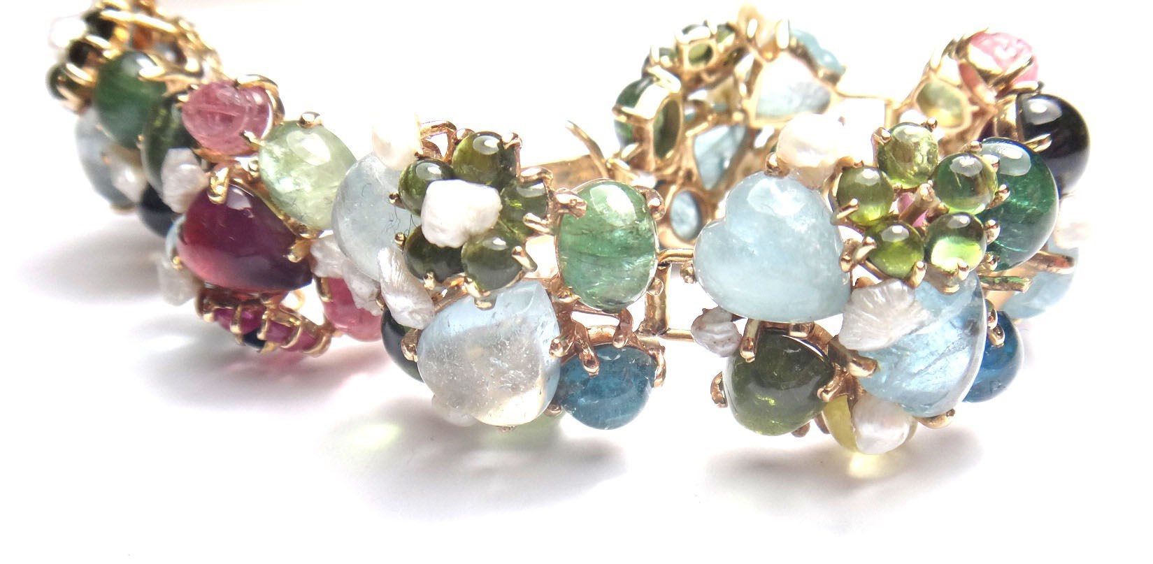 Appraisal: A gold aquamarine pink and green tourmaline and fresh water