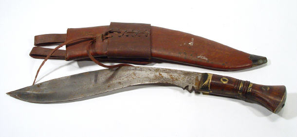 Appraisal: World War I military Ghurka knife in leather scabbard impressed