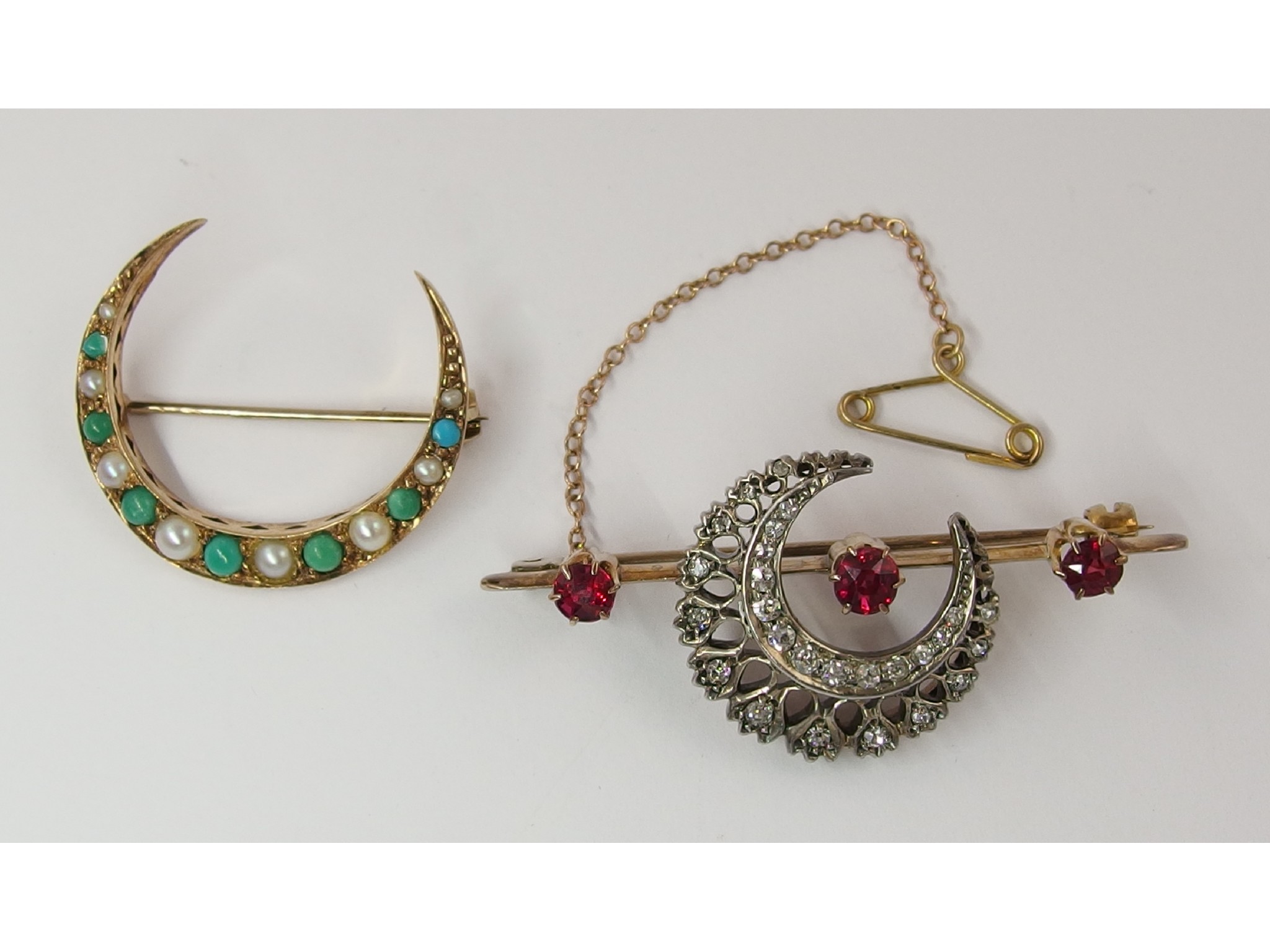 Appraisal: A Victorian diamond and ruby crescent moon broochthe filigree crescent