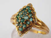 Appraisal: A carat gold emerald and diamond ring head approx x