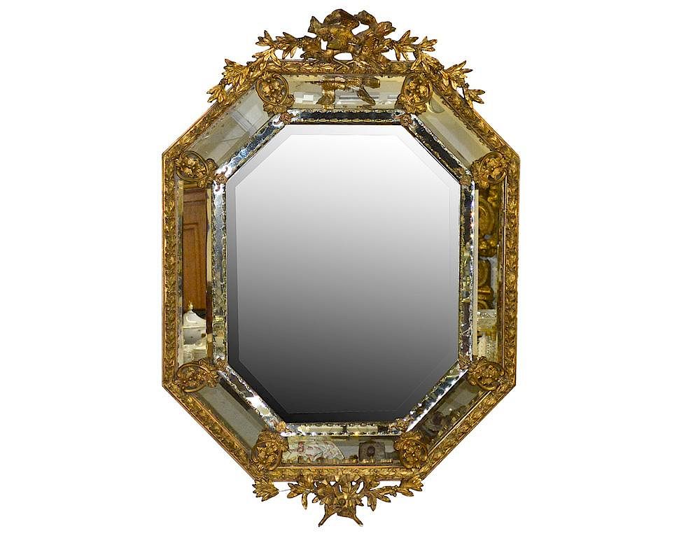 Appraisal: LOUIS XVI STYLE GILT MIRROR The octagonal mirror plate surrounded