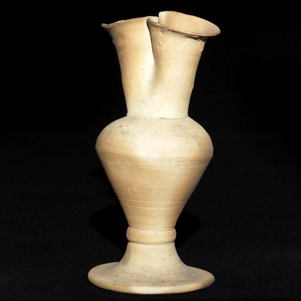 Appraisal: GEORGE OHR Bisque fired footed vase with a double-lobed rim