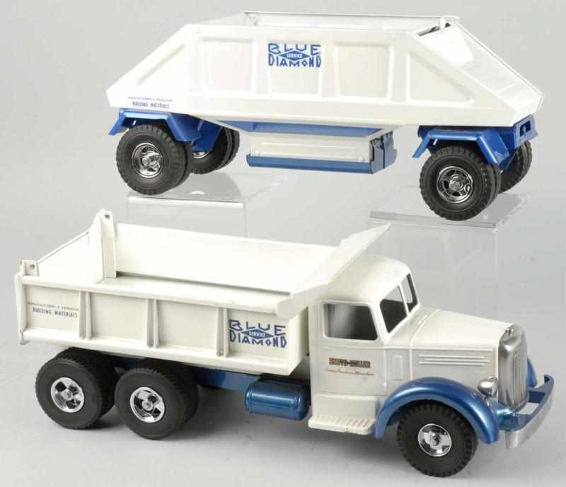 Appraisal: Lot of Fred Thompson Blue Diamond Trucks Toys Description Includes