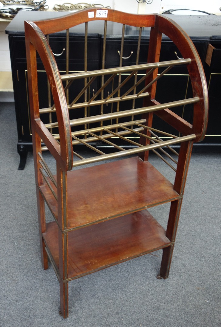 Appraisal: An early th century French brass inlaid mahogany magazine stand