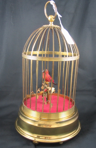 Appraisal: A SWISS MECHANICAL BIRD IN CAGE the a brass plated