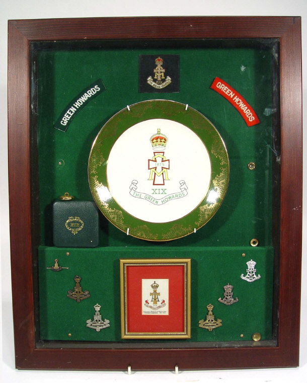 Appraisal: Green Howards military commemorative presentation display with embroidered badges metal