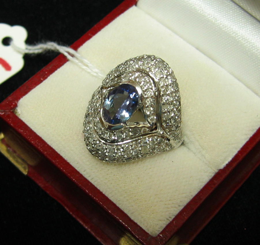 Appraisal: TANZANITE DIAMOND AND FOURTEEN KARAT WHITE GOLD RING WITH APPRAISAL