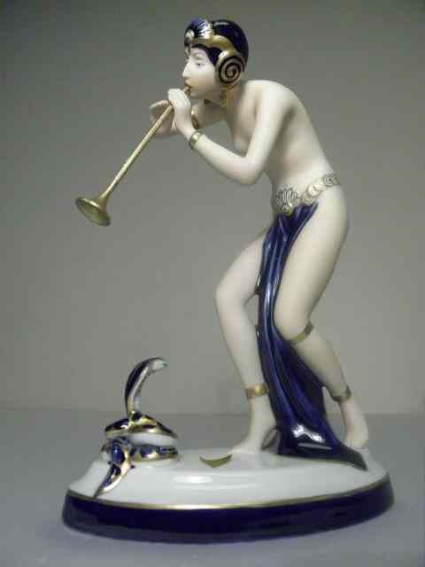 Appraisal: Royal Dux art deco style porcelain snake charmer figurine Paper