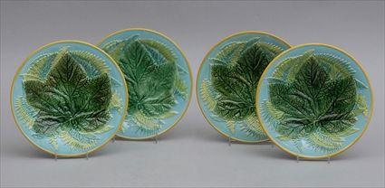 Appraisal: ASSEMBLED SET OF FOUR TURQUOISE-GLAZED GRAPE PLATES Variously marked one