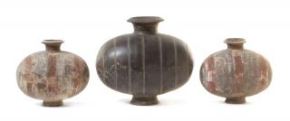 Appraisal: Three Pottery Cocoon Jars Three Pottery Cocoon Jars HAN DYNASTY