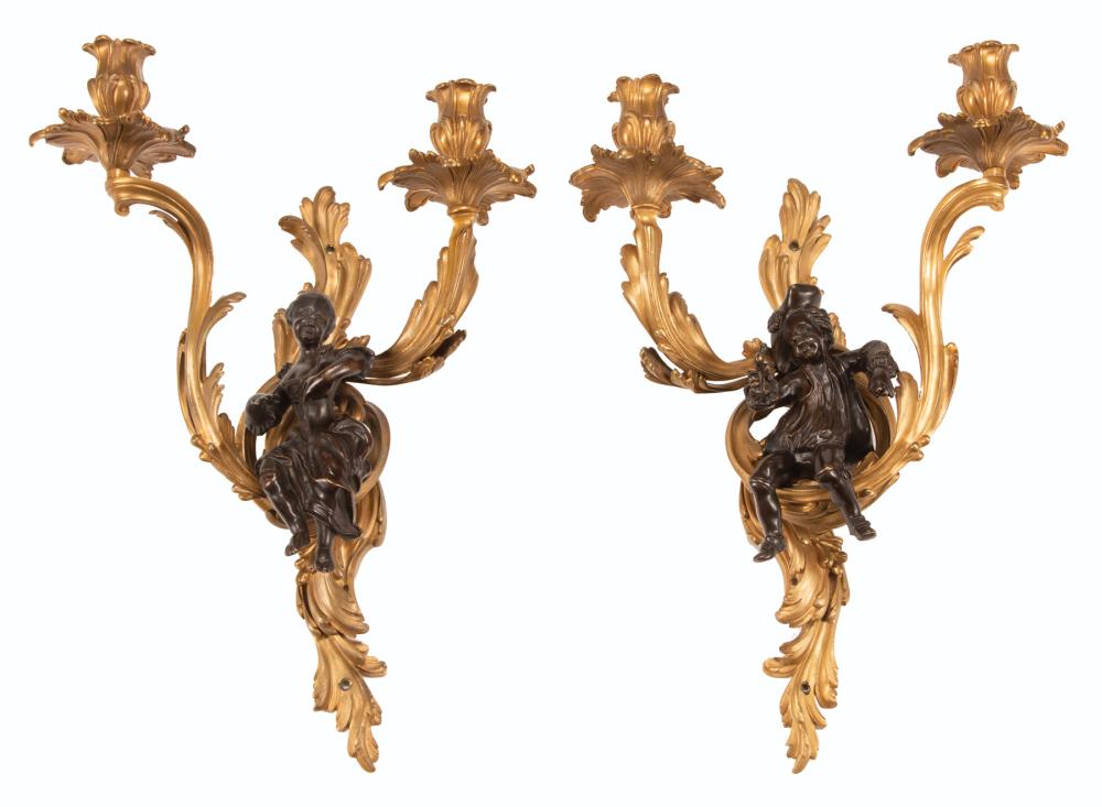 Appraisal: Pair of Louis XV-Style Gilt and Patinated Bronze Two-Light Figural