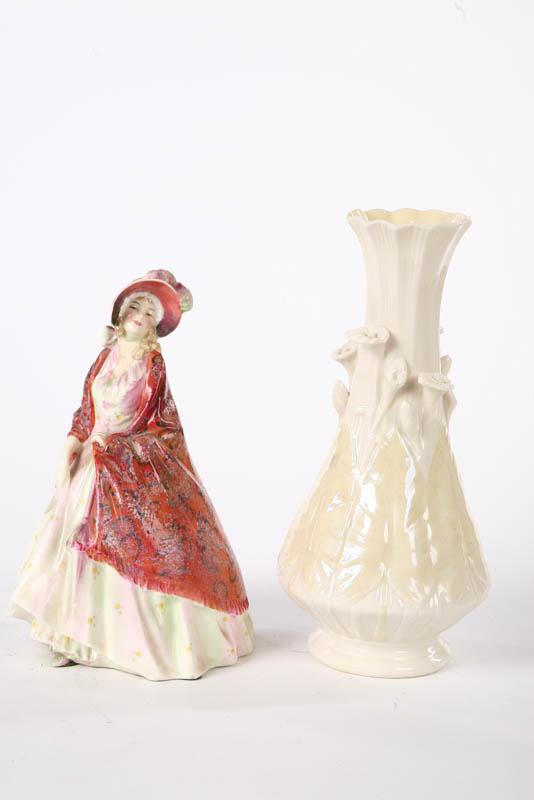 Appraisal: TWO PIECES OF POTTERY A Royal Doulton figure The Paisley