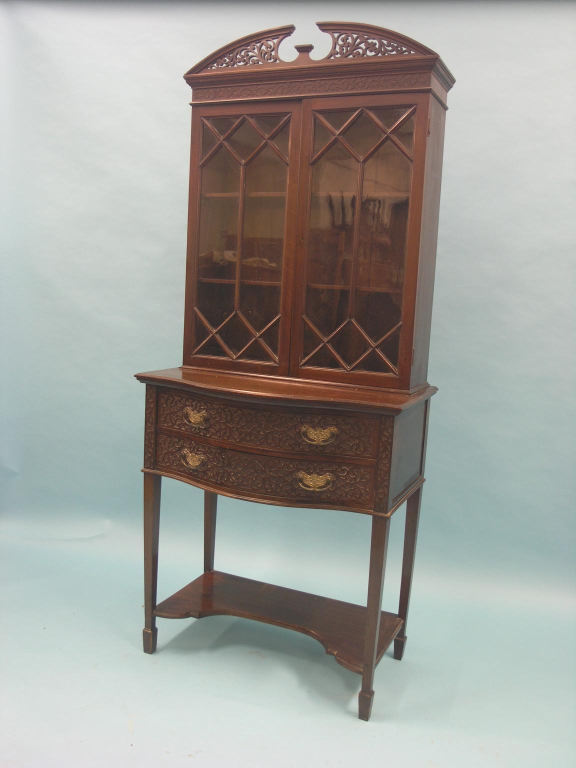 Appraisal: A late Victorian mahogany bookcase pair of astragal-glazed doors enclosing