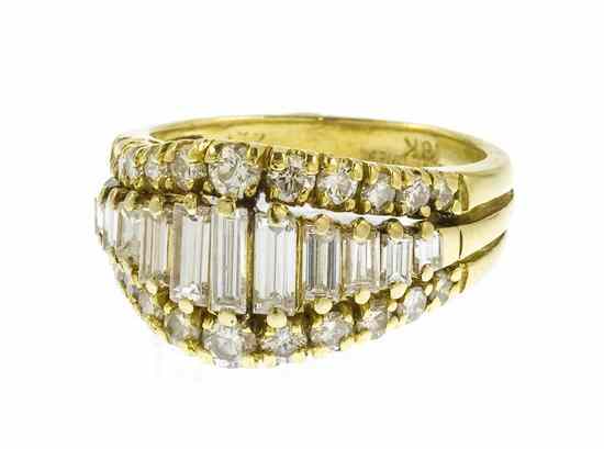 Appraisal: An Karat Yellow Gold and Diamond Ring containing baguette cut