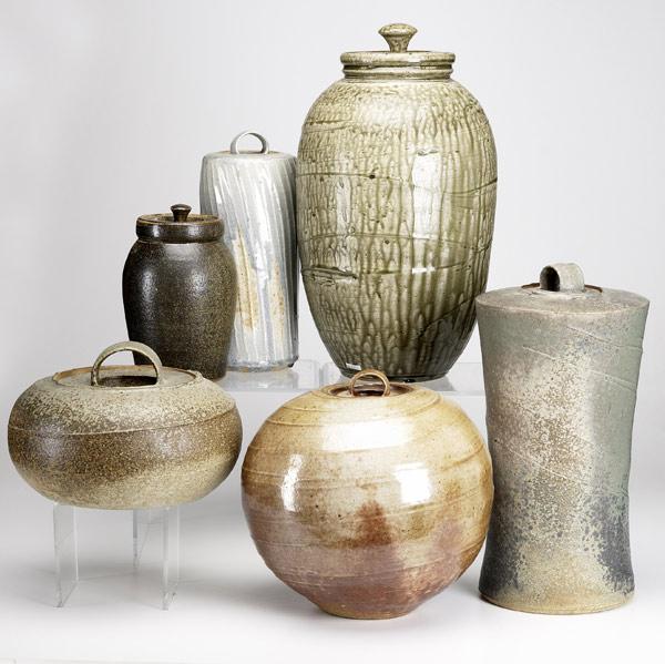 Appraisal: GEORGE LOWE Six piece collection of stoneware covered jars Most