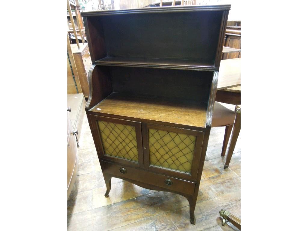 Appraisal: A Regency style dwarf mahogany bookcase cabinet with reeded open