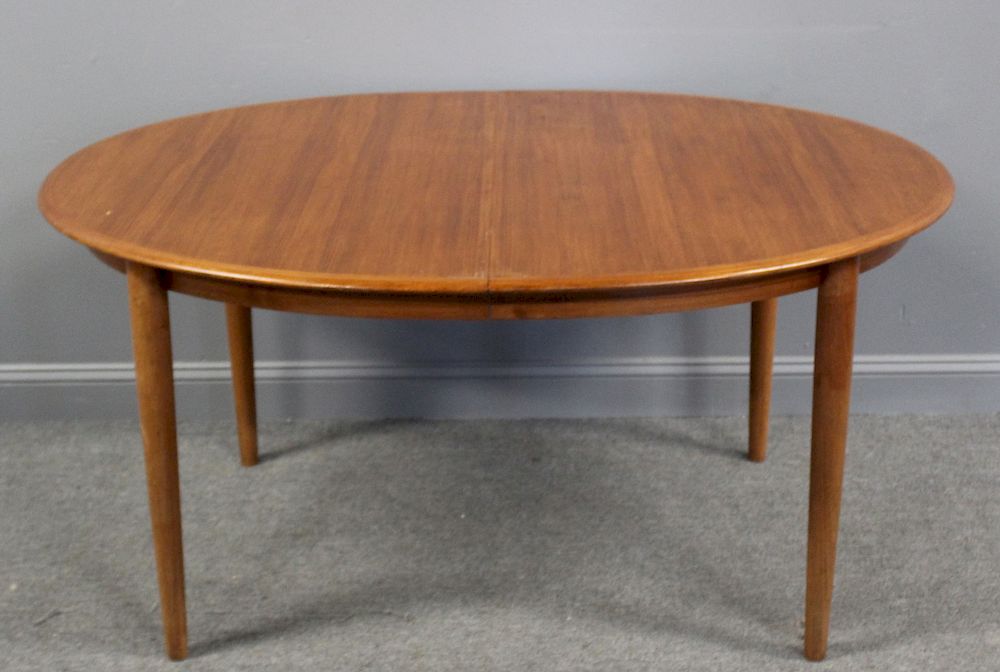 Appraisal: MIDCENTURY Teak Oval Dining Table With Leaves From a New