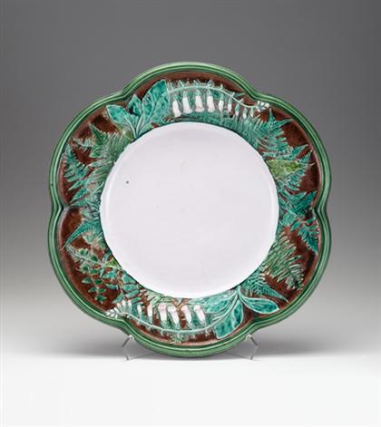 Appraisal: Mintons majolica charger date mark Of lobed circular form molded