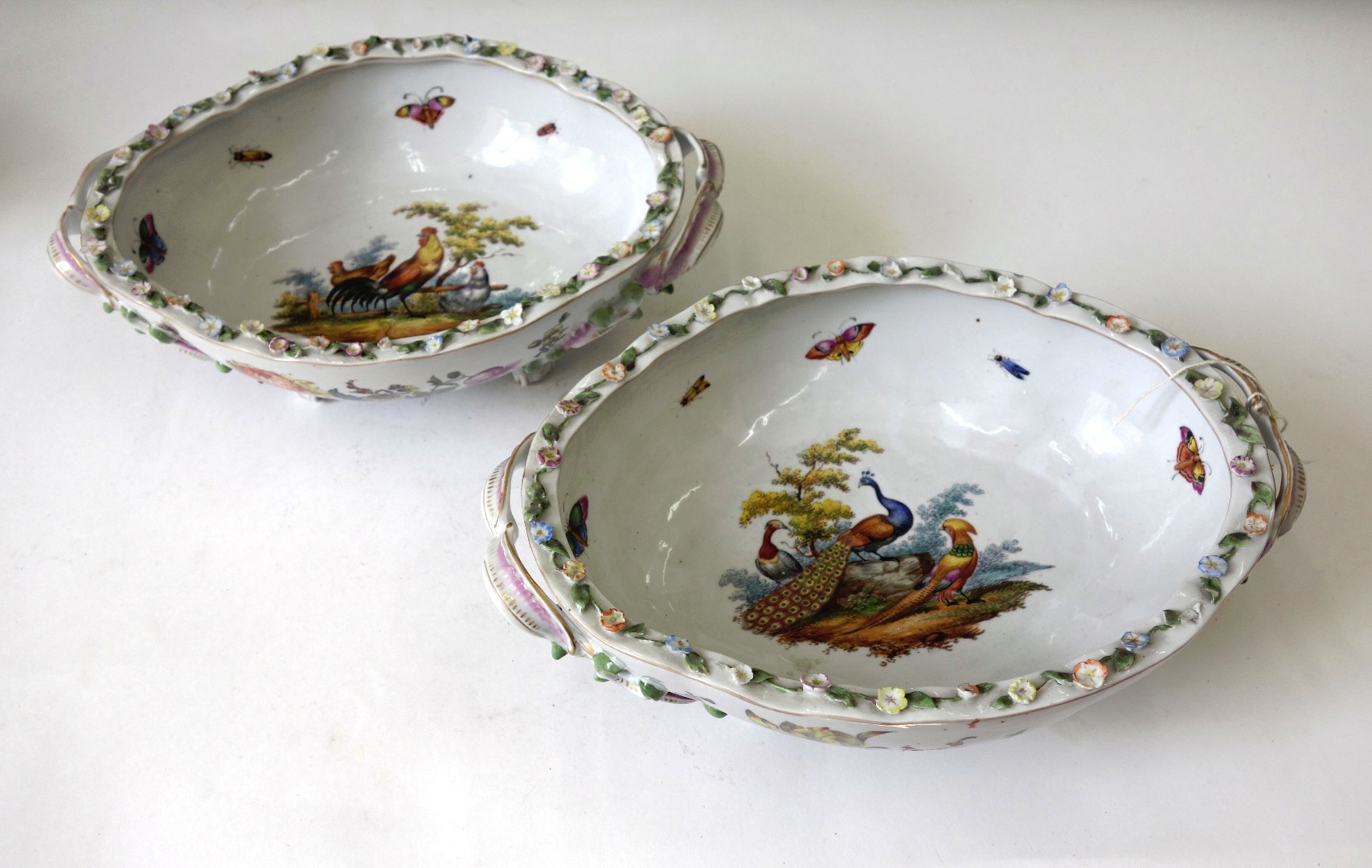 Appraisal: A pair of German porcelain oval two handled dessert baskets