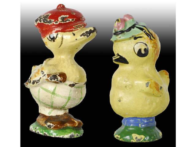 Appraisal: Golfer Duck Chick Cast Iron Paperweight Description Lot of two