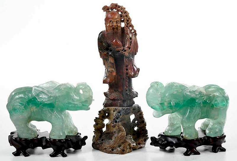 Appraisal: Three Chinese Carved Stone Figures pair of carved fluorite elephants