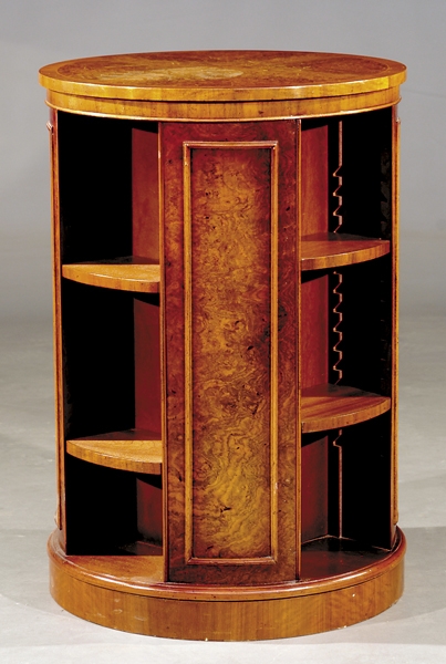 Appraisal: Regency style mahogany and burl walnut revolving bookcase circular form