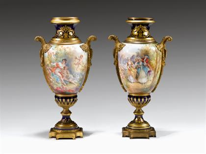 Appraisal: Pair of Sevres style gilt bronze mounted urns signed ch