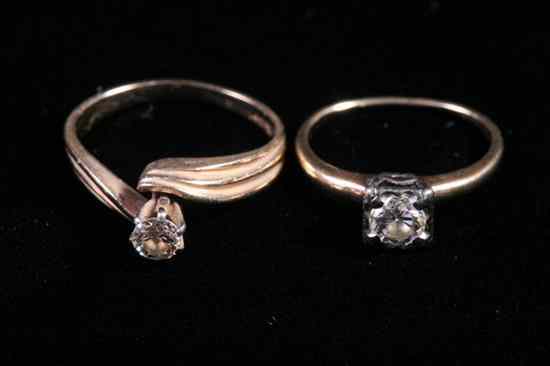 Appraisal: TWO K YELLOW GOLD AND DIAMOND ENGAGEMENT TYPE RINGS One