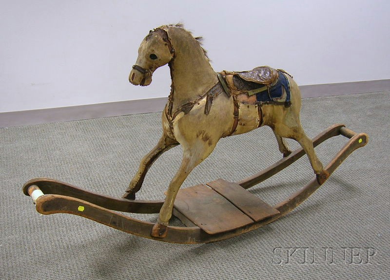 Appraisal: th Century Child's Hide-clad Carved Wooden Rocking Horse with flat