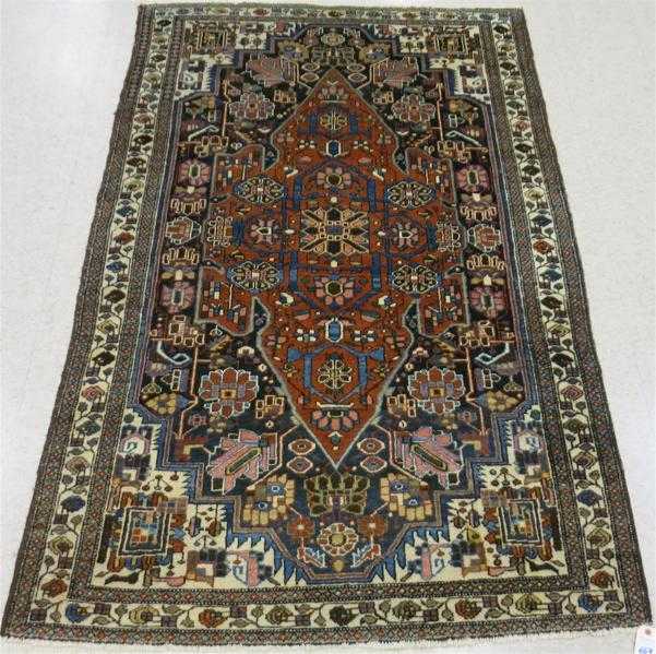 Appraisal: SEMI-ANTIQUE PERSIAN HAMADAN AREA RUG stylized floral design hand knotted