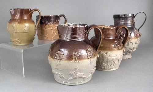 Appraisal: An early th Century Mortlake stoneware jug with applied mouldings