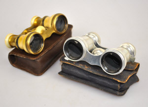 Appraisal: A pair of mother-of-pearl and polished steel opera glasses by