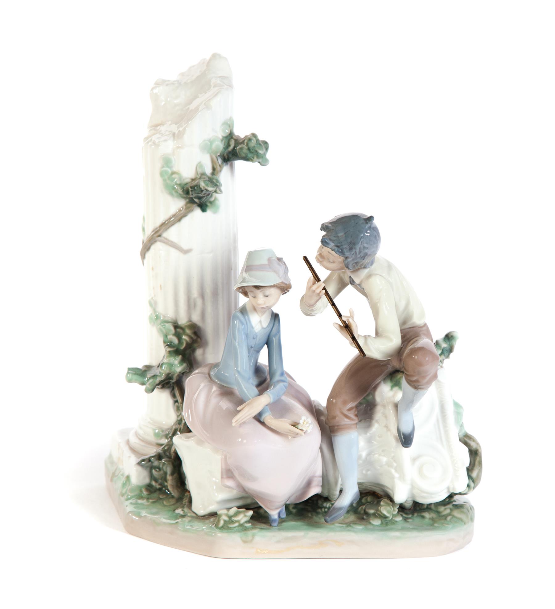 Appraisal: LLADRO FIGURAL GROUP OF BOY SERENADING A GIRL WITH HIS