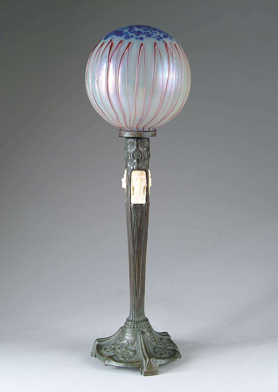 Appraisal: ART NOUVEAU TABLE LAMP Lamp begins with Loetz ball shade