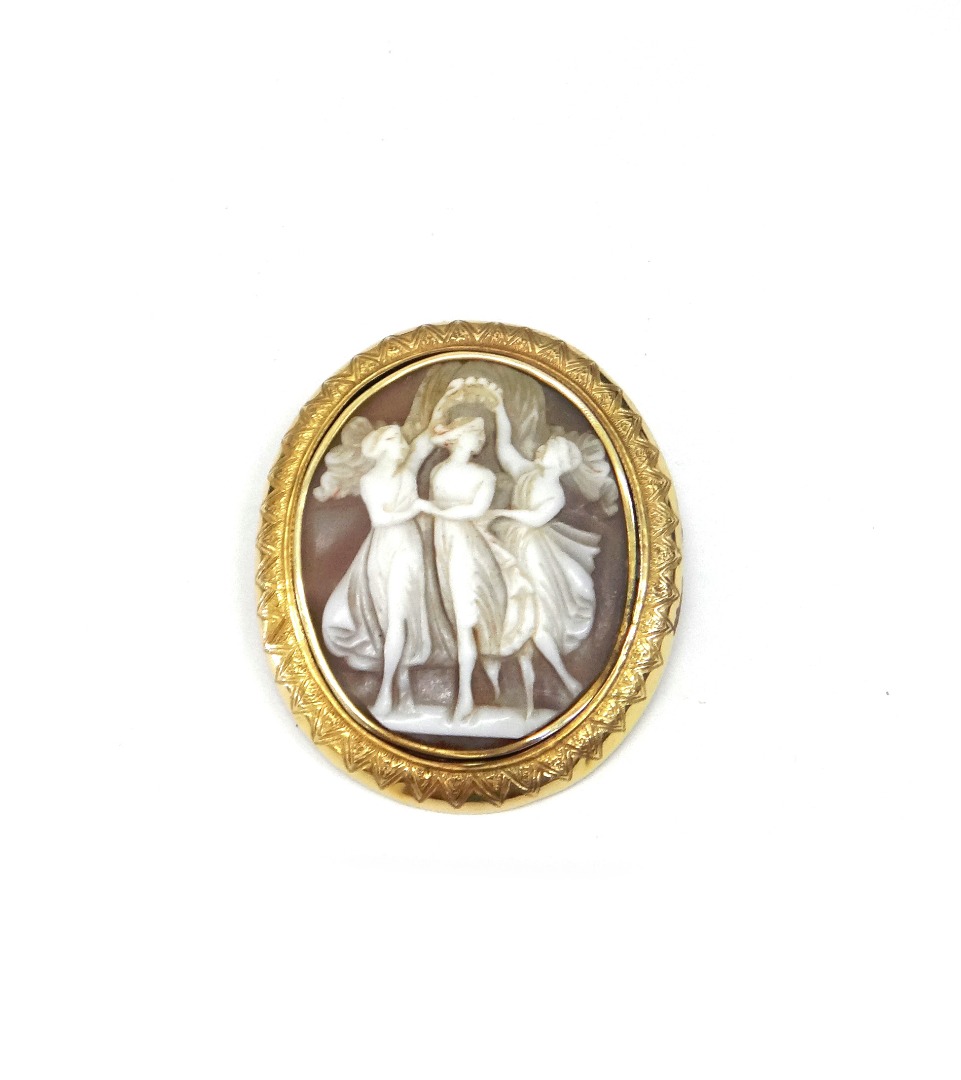 Appraisal: A Victorian shell cameo brooch carved depicting the Three Graces