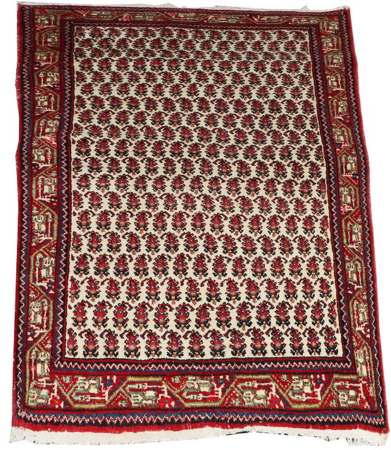 Appraisal: A SEREBEND CREAM GROUND RUG with multi-colour boteh motif and