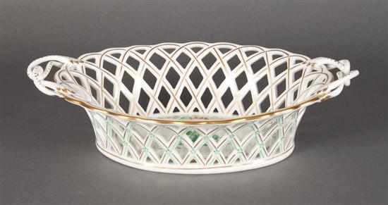 Appraisal: Herend reticulated porcelain basket in the ''Green Chinese Bouquet'' pattern