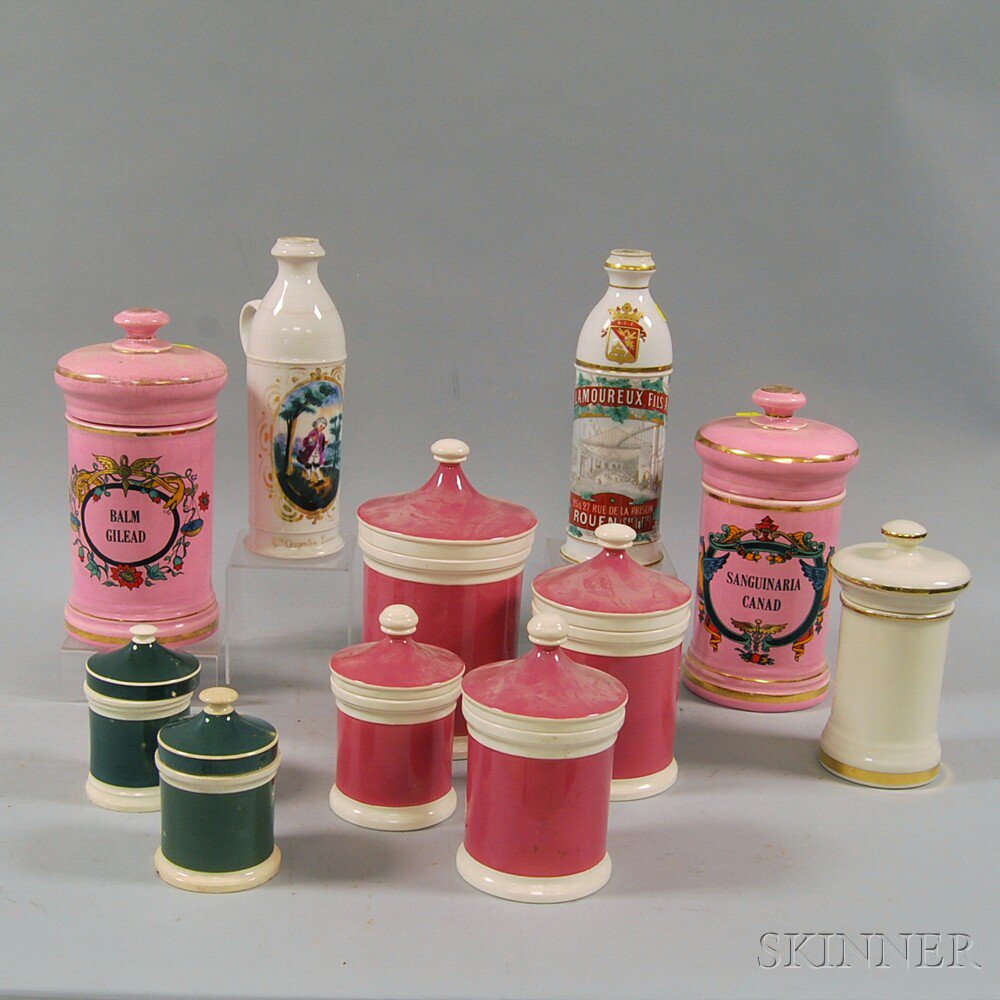 Appraisal: Eleven Ceramic Jars and Bottles six pink and green canisters