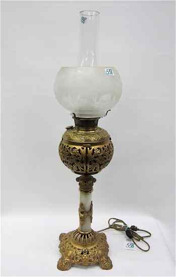 Appraisal: BRADLEY HUBBARD TABLE LAMP electrified oil lamp gilt metal base