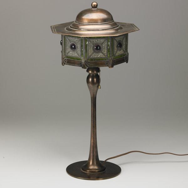 Appraisal: JUGENDSTIL STYLE Copper-patinated brass table lamp its faceted shade with