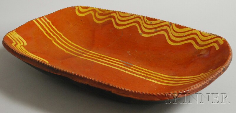 Appraisal: Slip-decorated Redware Loaf Dish America early th century oblong dish