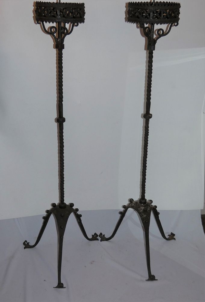 Appraisal: PAIR A C IRON FLOOR CANDLESTICKS Pair antique wrought iron