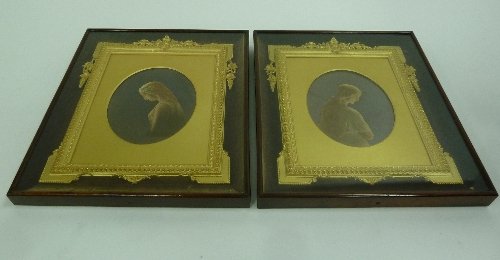 Appraisal: Two oval prints of young women in ornate gilt frames