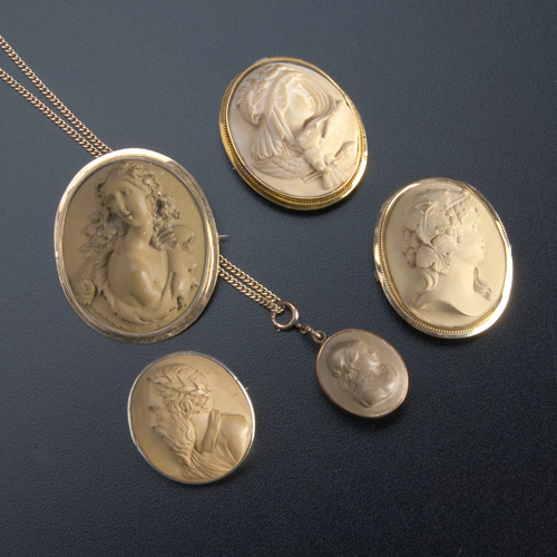 Appraisal: Five pieces of th C jewelry with lava cameos gold