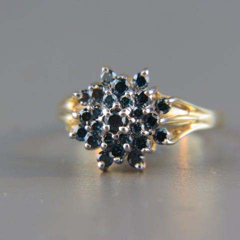 Appraisal: Fancy Blue Diamond Ring round diamonds totaling carat in a