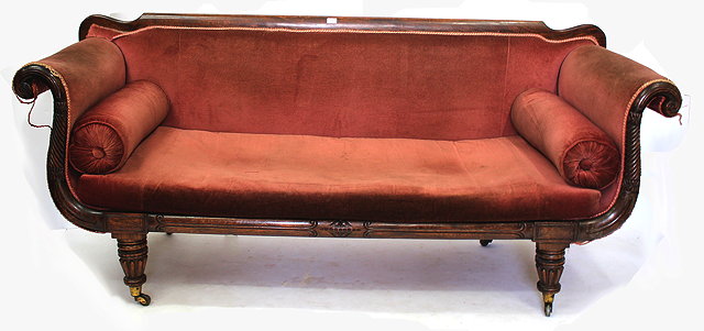 Appraisal: AN EARLY TH CENTURY SIMULATED ROSEWOOD AND UPHOLSTERED SCROLL END