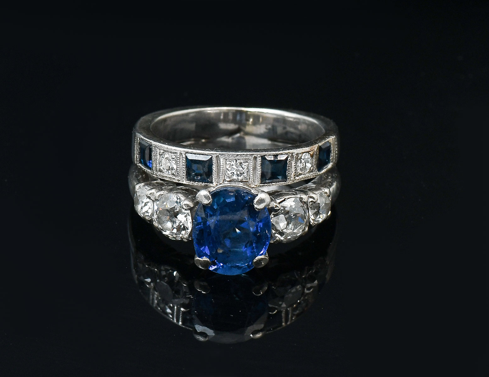 Appraisal: PLATINUM SAPPHIRE DIAMOND RING SET Iridium Platinum engagement ring centered