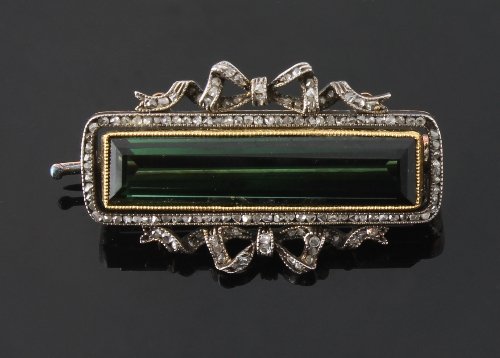 Appraisal: A green tourmaline brooch by Faberge the rectangular frame with