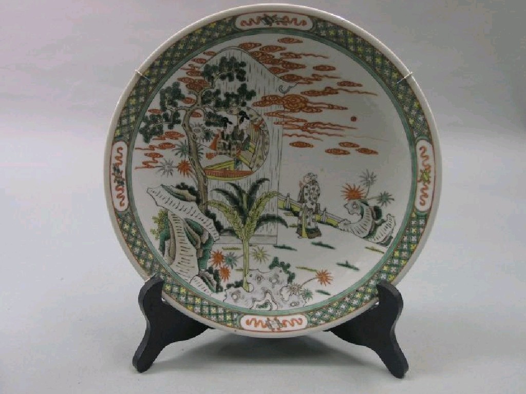 Appraisal: A pair of th century Chinese 'Kangxi' wall plates painted