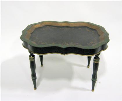 Appraisal: Toleware tray on stand The shaped oval tray painted with